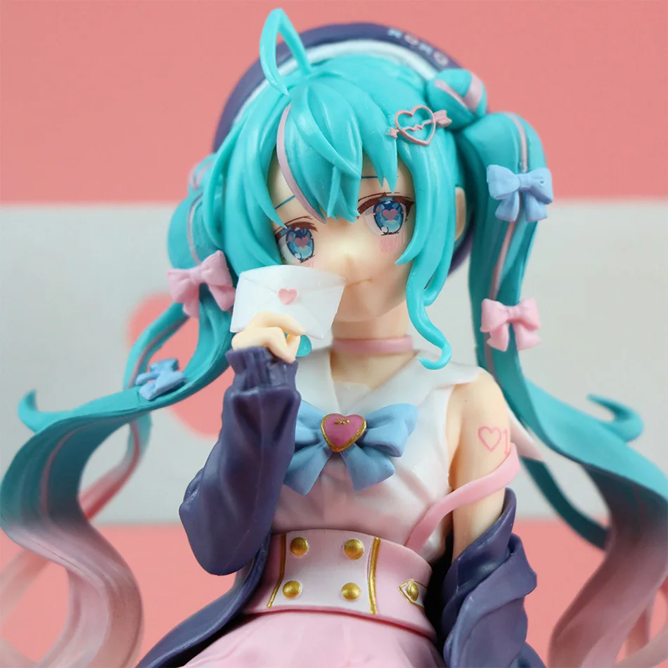 New Hatsune Miku Anime figure Pink sakura sitting position PVC 13CM Action figure model toy decoration collect gifts