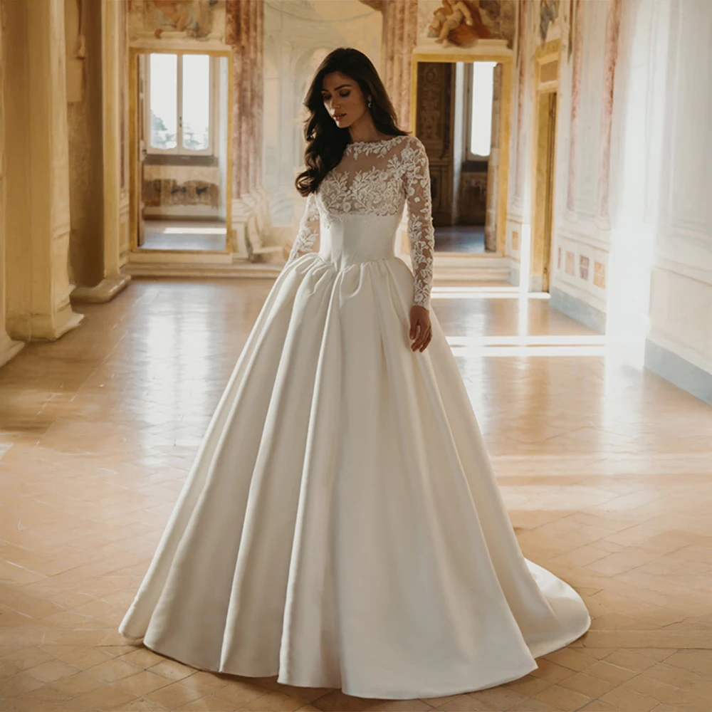 

Customized Luxurious Satin Ball Gown Wedding Dress with Intricate Lace Long Sleeves Bridal Gown for Royalty-Inspired Weddings