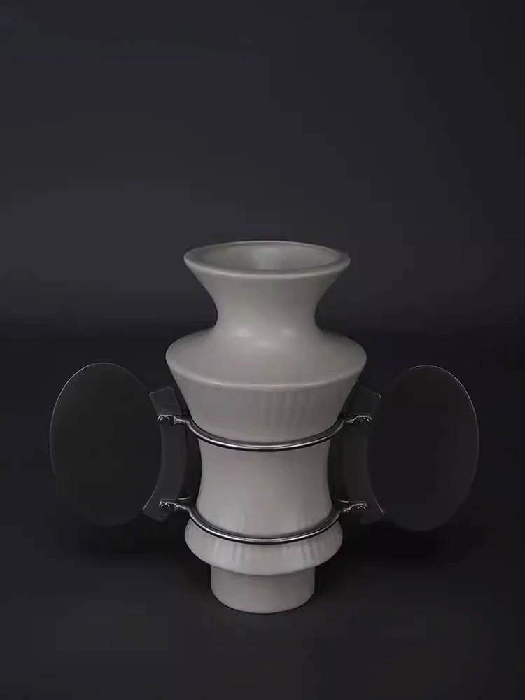 Partially dislocated utensils, binaural flower hugging device (open)