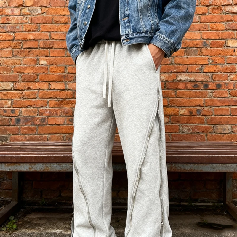 

Winter streetwear with multiple zipper decorations, loose straight leg sports pants, drawstring gray casual pants