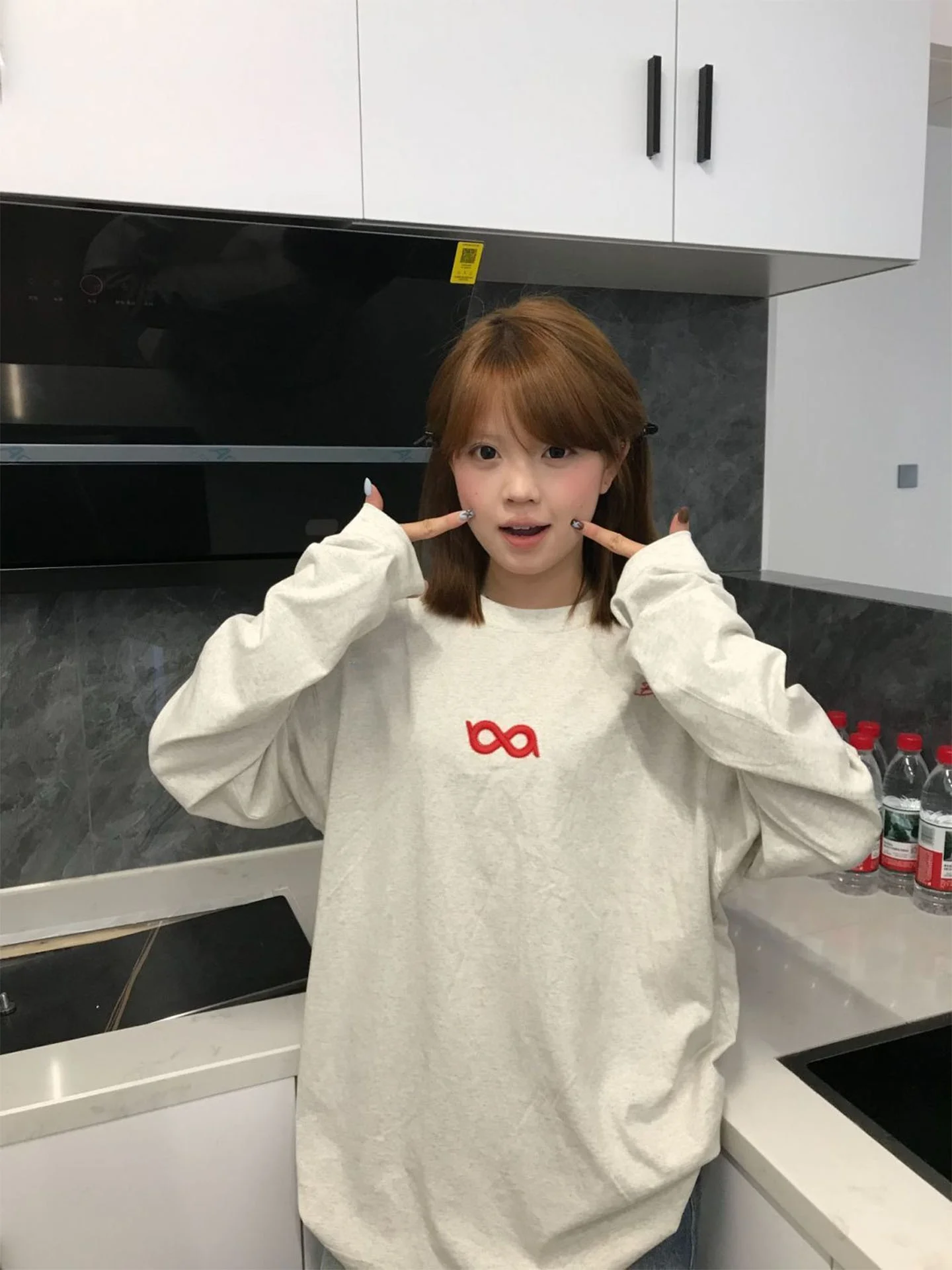 T-shirt lunga ampia in cotone Sve Coreano Sle Campus Stampa Top casual per donna Stagione autunnale Faionable e confortevole