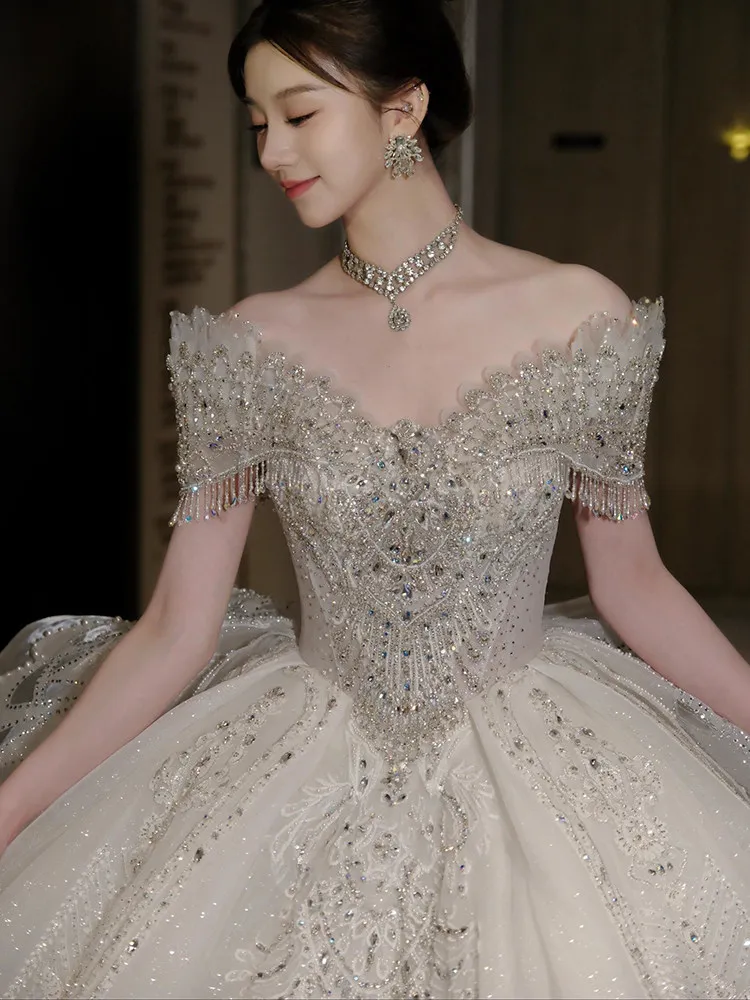 Robes de mariée à paillettes robe de soirée de mariage haut de gamme avec traîne brosse robe de mariée de luxe personnalisée 2026 robes de mariée brillantes