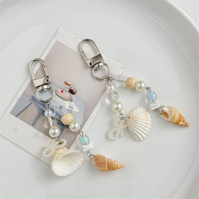 

1PC Fashion Shell Pearl Bag Pendant Keychain Ocean Style Conch Phone Lanyard Car Key Jewelry Womens Backpack Purse Accessories