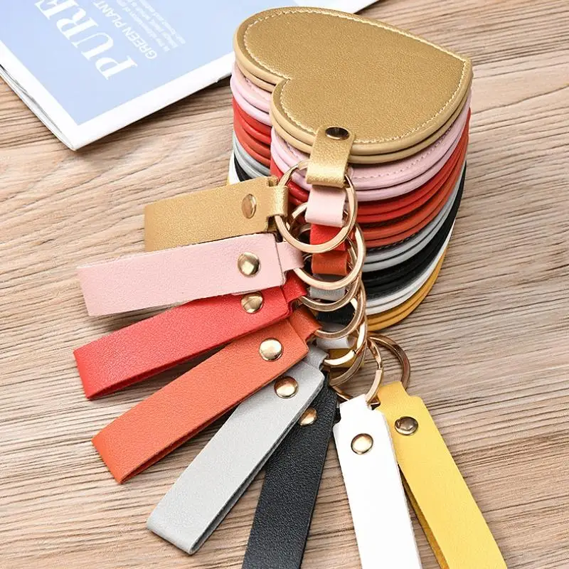 بو الجلود واحدة الجانب مرآة ماكياج الجمال المفاتيح على ظهره الشنق المحمولة النساء شكل قلب مرآة لوضع مساحيق التجميل كيرينغ