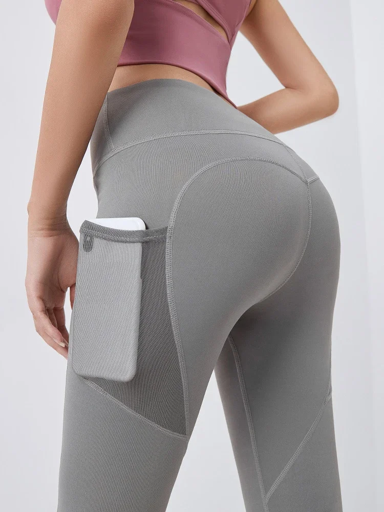Pop กางเกงโยคะกระเป๋าสะโพกยก Bottoming Quick-drying เสื้อผ้าโยคะ Breathable ยืดตาข่ายกระเป๋าด้านข้างวิ่งออกกําลังกายกางเกง