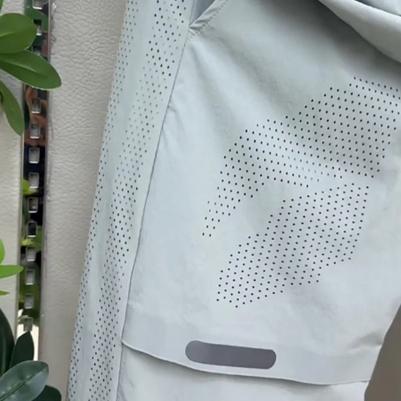 Conjunto de ropa deportiva informal de seda helada transpirable de verano 2025, pantalones largos informales de secado rápido con cremallera a la moda y 2 uds de manga corta
