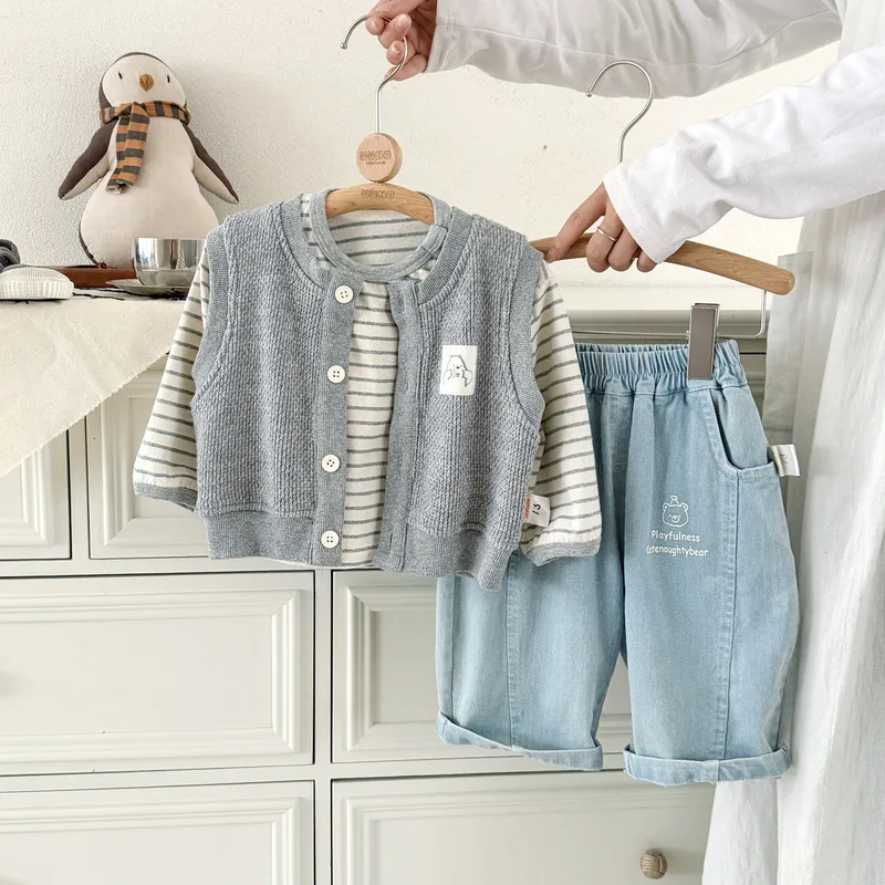 Korean-style baby outfit, new spring/autumn collection, unisex, gray knitted vest, striped top, light blue denim pants, wholesal