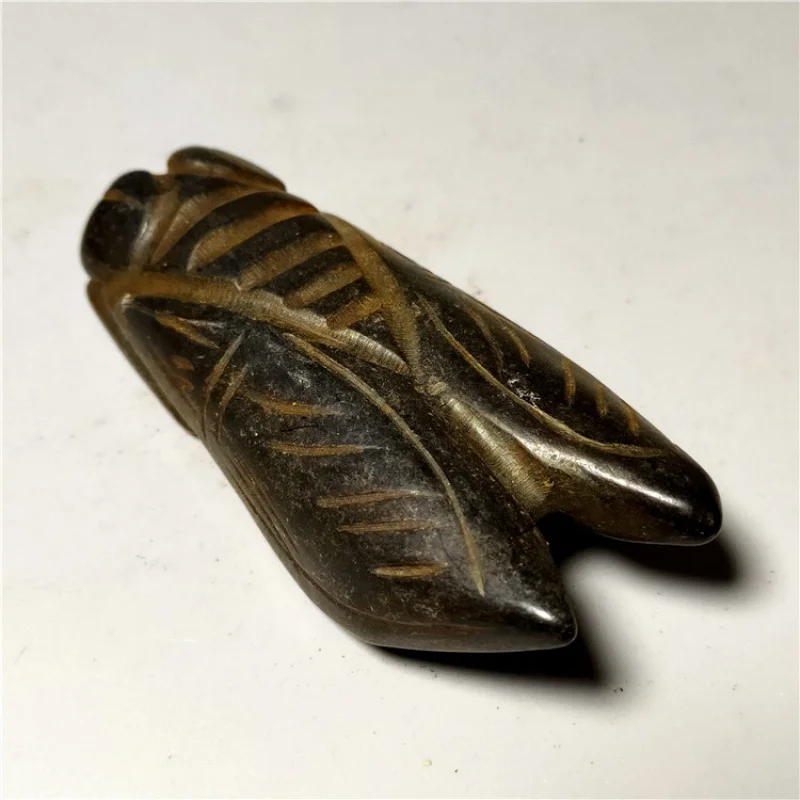 

Supply of antique-style red mountain culture iron stone carved golden cicada pendant for wholesale