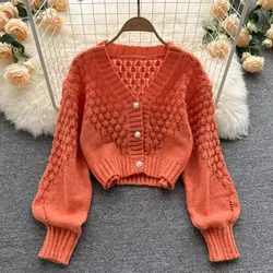 Cardigan da donna con scollo a v e maniche a lanterna in maglia acrilica scavata arancione Cardigan monopetto per abbigliamento donna 2024