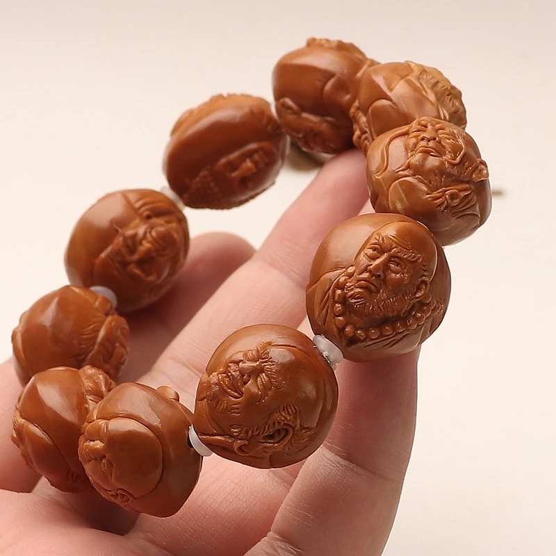 Realistic relief double-sided hand-carved Eighteen Arhats olive pit bracelet, a hand-carved cultural item for personal enjoyment