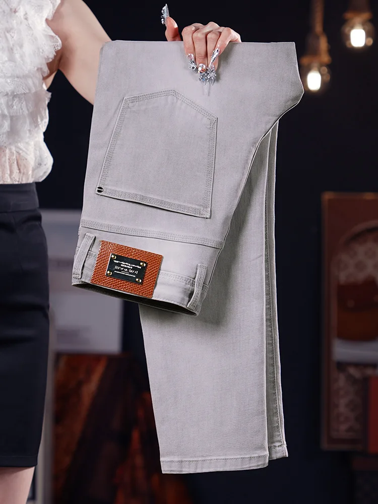

Summer thin light gray jeans for men, slim fit with small feet, fashionable trend, casual, light luxury pants