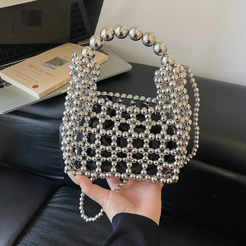 2026 new niche, simple, elegant, hollowed out handmade bead dumpling bag with antique style woven handbag