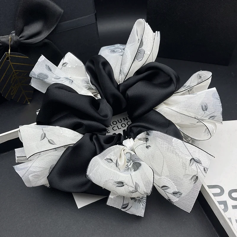 

New printed butterfly bow satin large intestine headband for women, fashionable new style, versatile temperament,