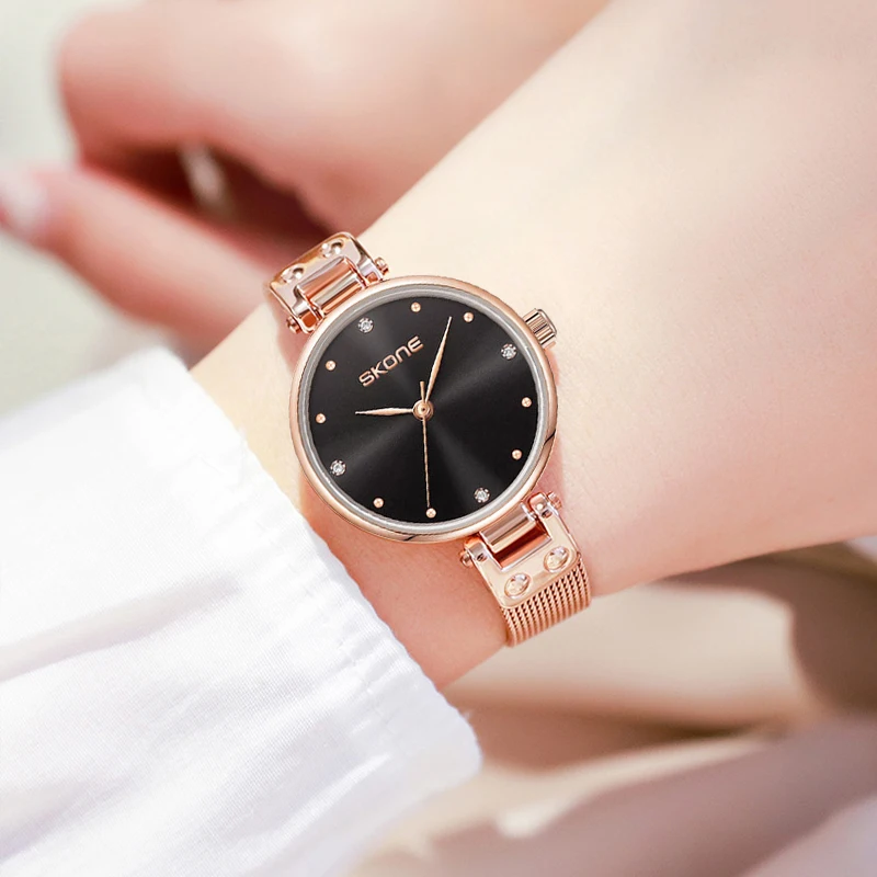 SKONE นาฬิกาผู้หญิง สไตล์เกาหลี Ins แฟชั่น เบา หรูหรา อินเทรนด์ นักเรียน นาฬิกาสายตาข่ายเหล็กอารมณ์เรียบง่าย