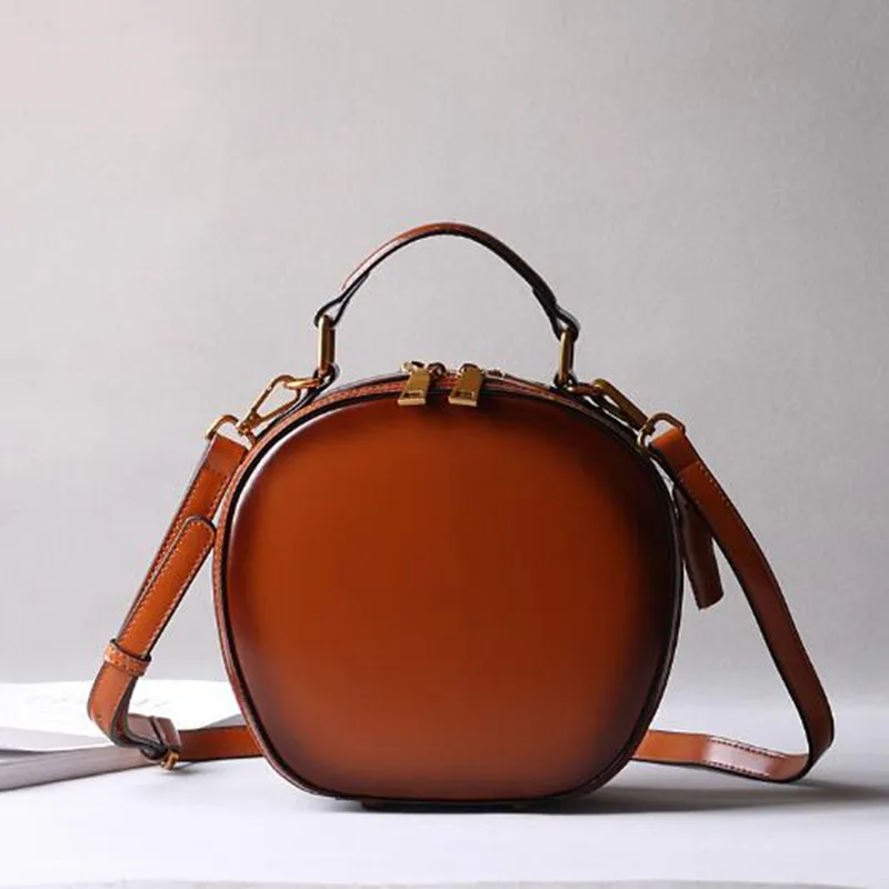 Cowhide bag 2025 new leather female retro apple bag single shoulder crossbody portable fashion small round bags