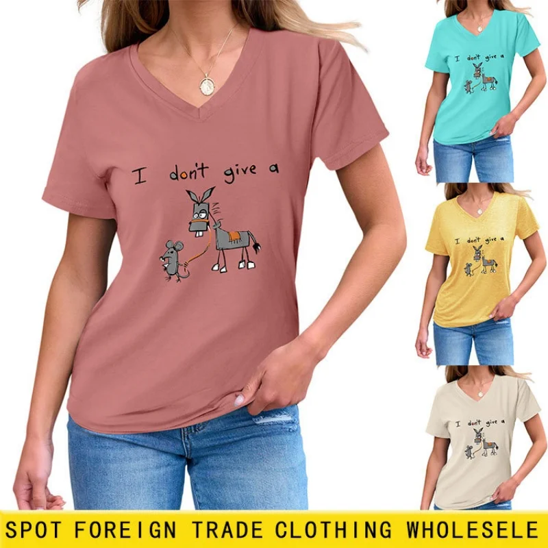 

V-neck short-sleeved printed summer blouse with unique shoulder design, a stylish and niche piece for women.