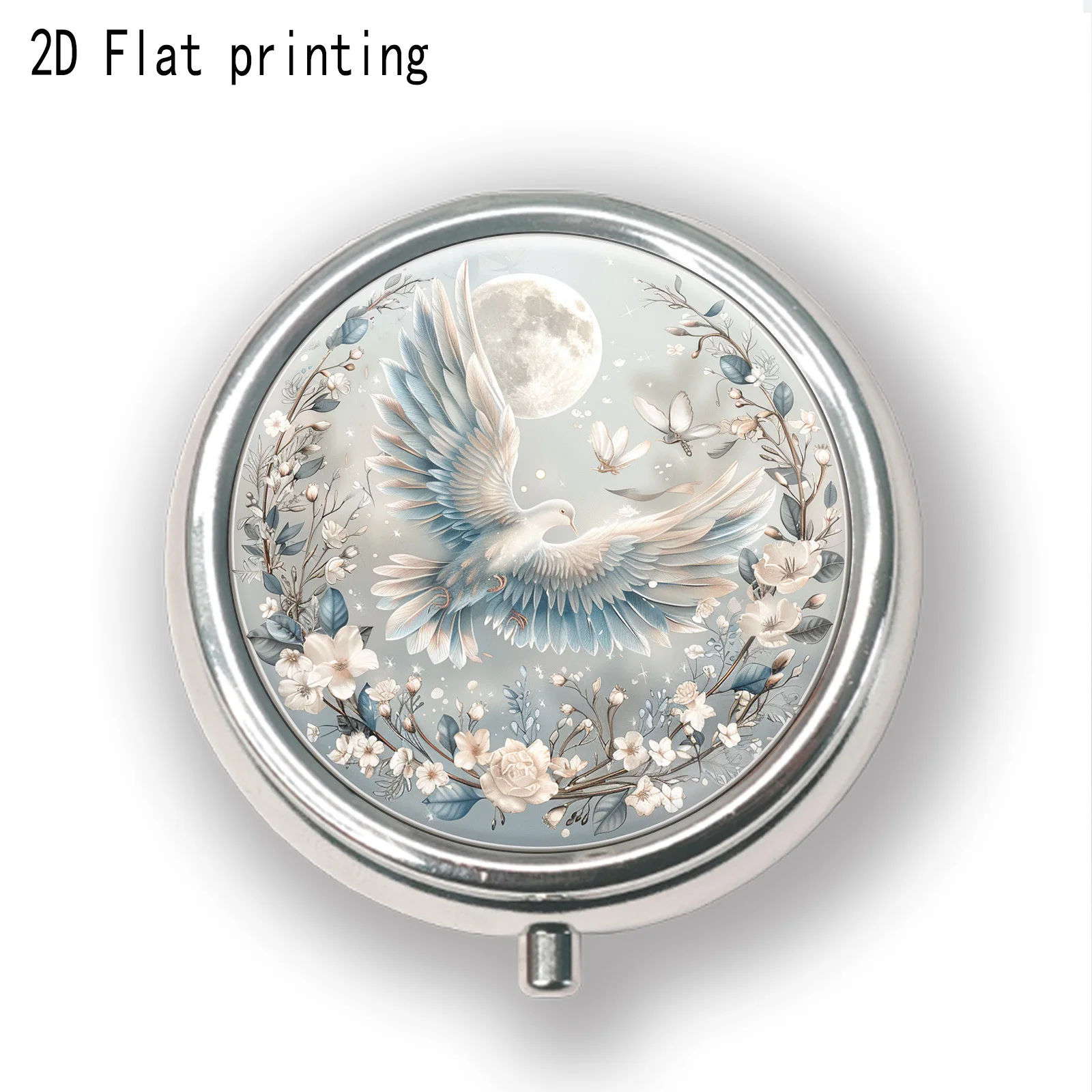 A three-compartment portable pill box, featuring a two-dimensional design with a white dove and cool-toned floral pattern on the front. It can also be used as a pill box or portable jewelry box, offering both convenience and portability, with a two-dimensional flat design