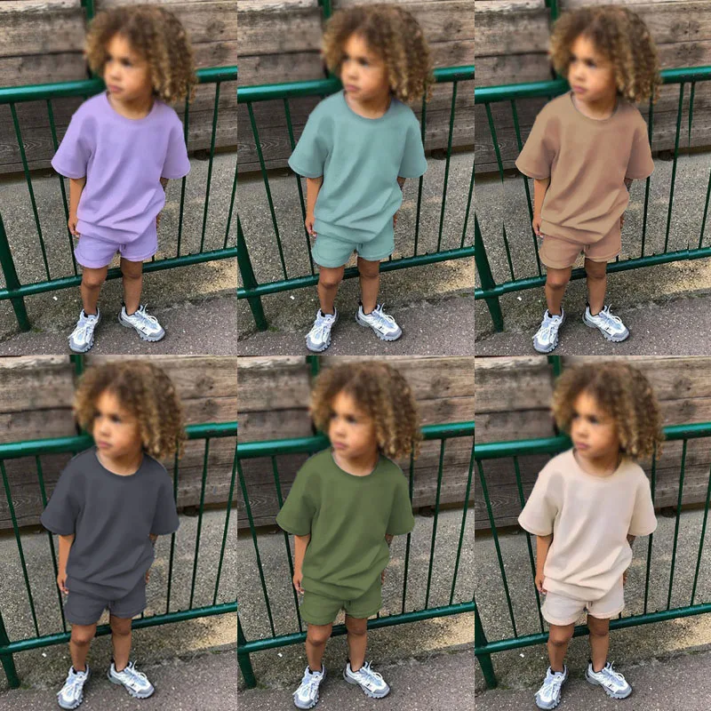 2024 estate bambini tinta unita Casual manica corta + pantaloncini elastici in vita 2 pezzi cotone Set bambino ragazze ragazzi abbigliamento