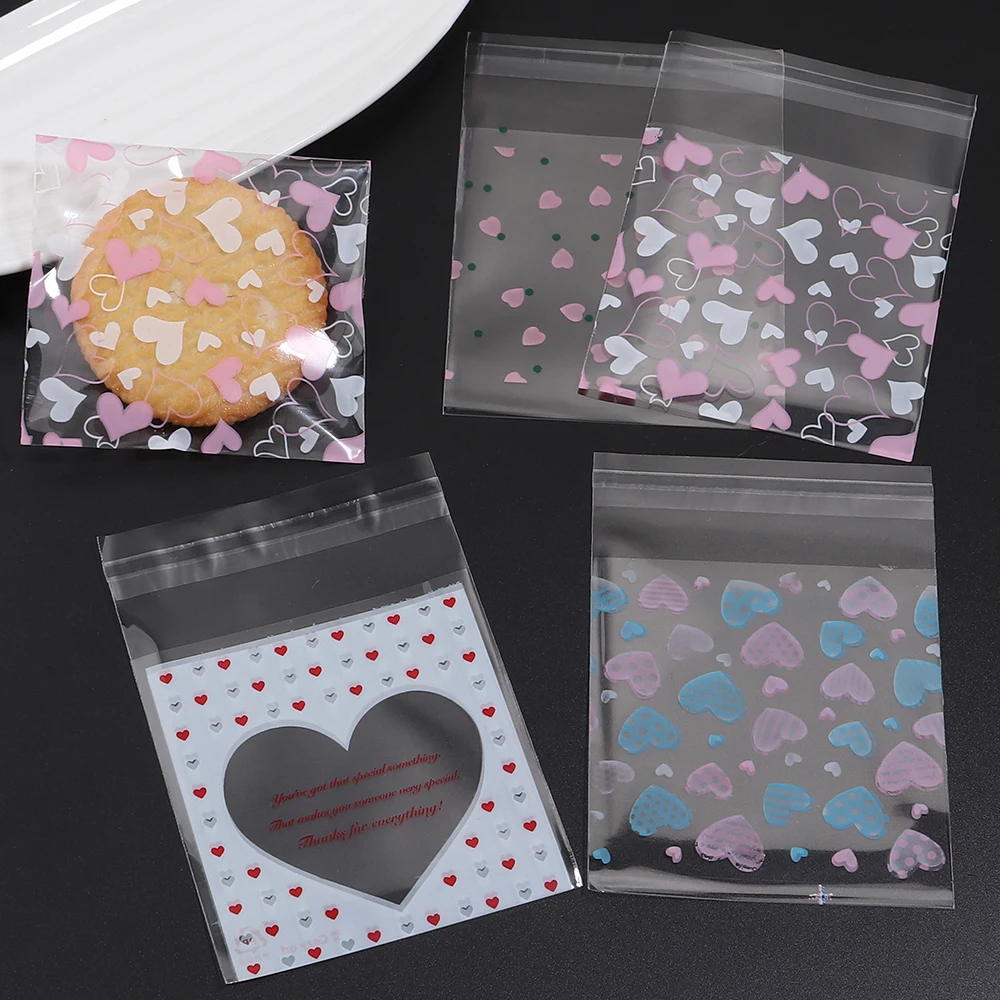 100pcs 7x7cm Heart Pattern Plastic Self Sealing Bag Jewelry Pouch OPP Bags For Christmas Party Candy Cookie Gift Packaging Bag