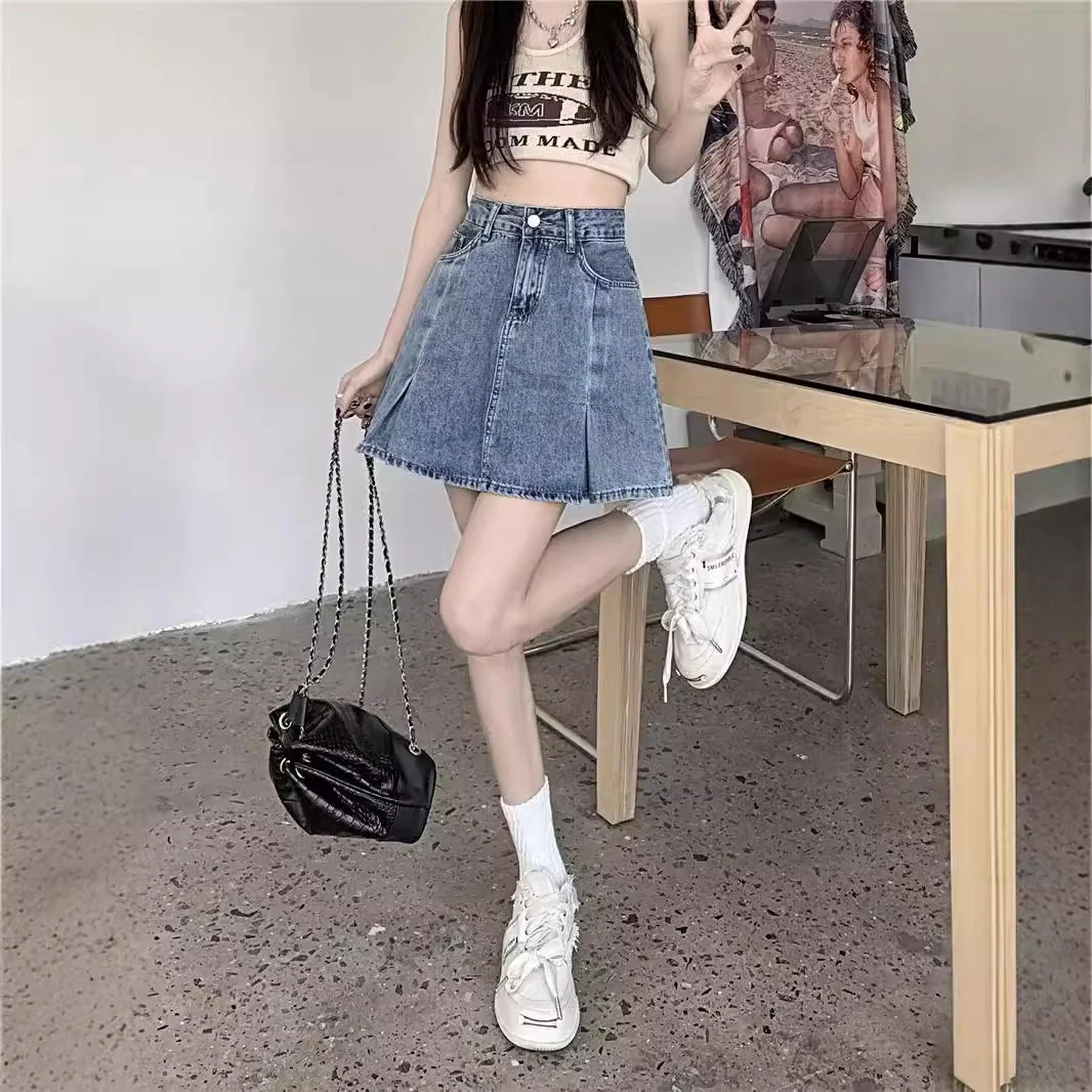 Nuova gonna corta in denim stile Hong Kong per donna in estate, ragazza calda con vita alta e effetto snellente, mezza gonna a trapezio versa