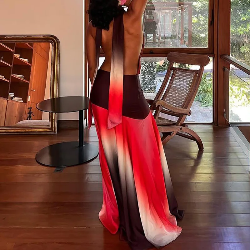 カラーブロッキングプリント背中の開いた女性ロングドレス中空ホルターローカットプリーツイブニングドレスファッションノースリーブルースビーチドレス
