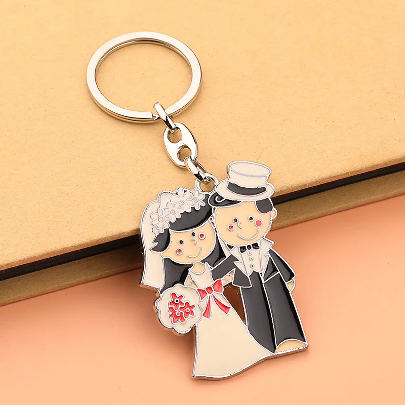 Hot Selling Metal Enamel Color Couple Bridegroom Bride Cartoon Creative Car Bag Exquisite Keychain Jewelry Pendant