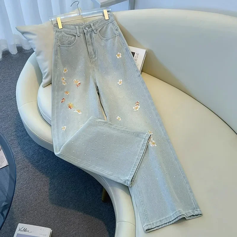 

Женские джинсы с высокой талией и широкими штанинами с цветочной вышивкой