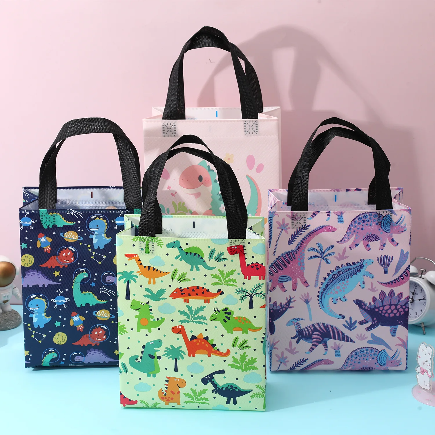 4 pz/set Cartoon Dinosaur Paper Gift Bag con manico Kid Birthday Favor confezione portatile Tote Bag Baby Shower Party Decoration