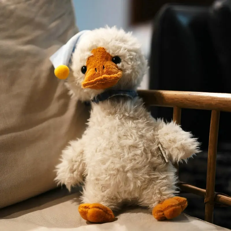 

Cute Fluffy White Duck Plush Toy with Sleepy Hat Messy Style Soft Ducky Doll for Kids and Home Decoration