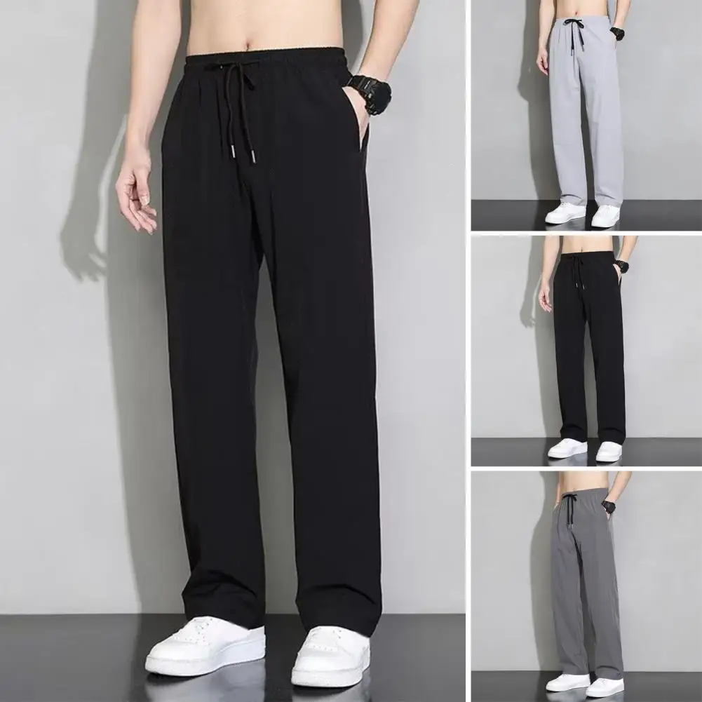 

Men Sweatpants Solid Color Men Pants Quick Dry Men's Gym Training Sweatpants with Elastic Waist Side Pockets Lightweight Ice