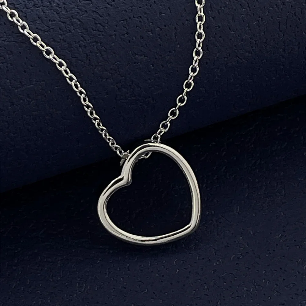 

Exquisite 925 silver jewelry, pierced heart-shaped pendant with thin chain, suitable for daily wear or gift giving