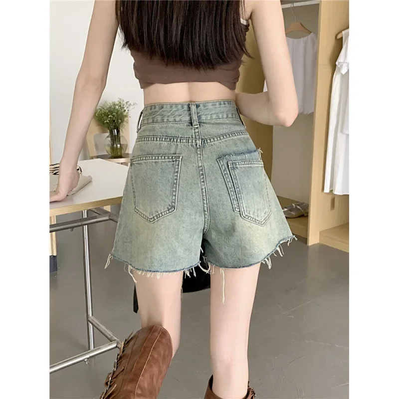 2025 été nouveau Style Vintage taille haute Holey a-ligne Denim Shorts femmes cloche bas pantalons décontractés origine chinoise