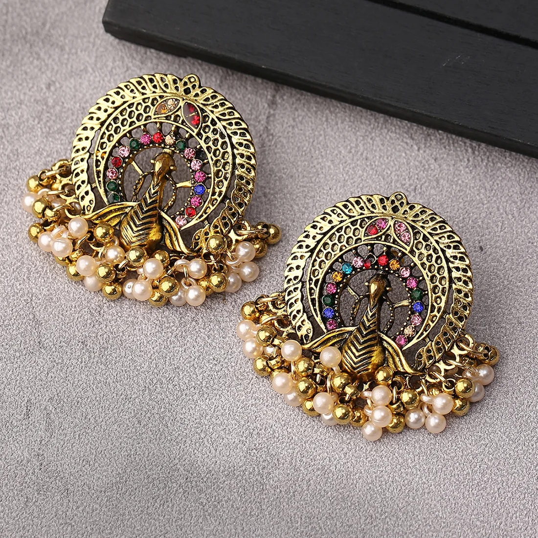 New retro peacock open screen shape inlaid pearl earrings fringed alloy earrings bohemian bell earrings