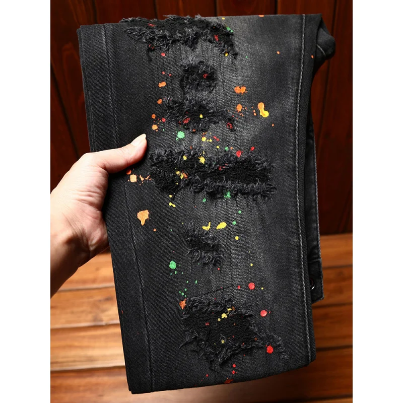 High end trendy black jeans for men, slim fit, elastic, perforated patch, paint printed, trendy street style small leg pants
