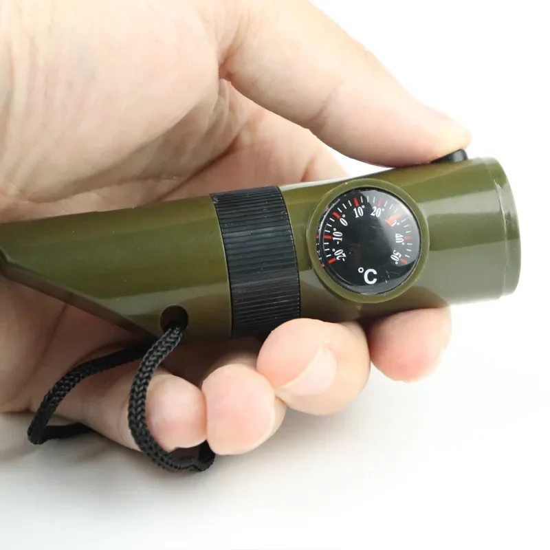 

Seven-in-one Multifunctional Compass Outdoor Camping Whistle Portable High Frequency Outdoor Emergency Whistle with Led Light