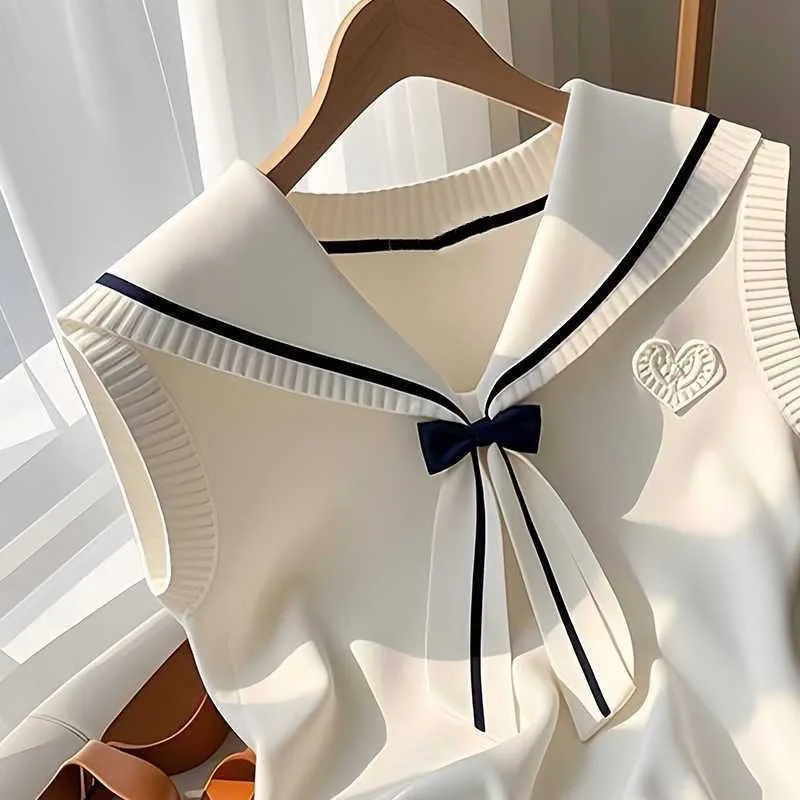 Loja de vendas leite branco gola marinha blusa feminina colete primavera verão nova gola boneca blusa coreano usar colete de malha boa aparência