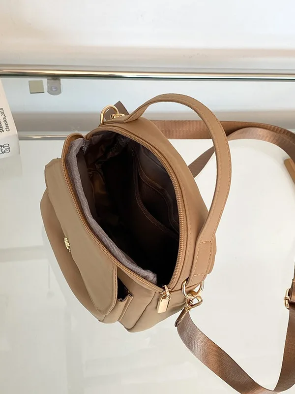 Bolso pequeño de un solo hombro para mujer, bandolera ligera de tela de nailon, bolso redondo pequeño para teléfono móvil, bolso de lujo 2024