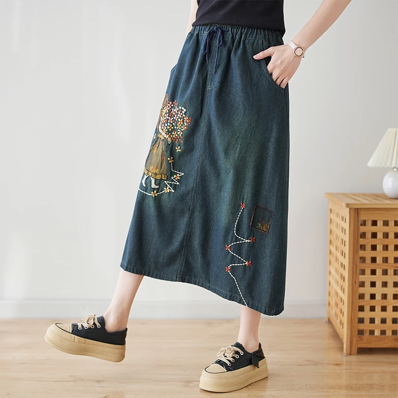 Jupe en jean brodée artistique rétro, polyvalente, ample, amincissante, décontractée, ligne a, parapluie, taille haute, mi-longue, en coton, poly...