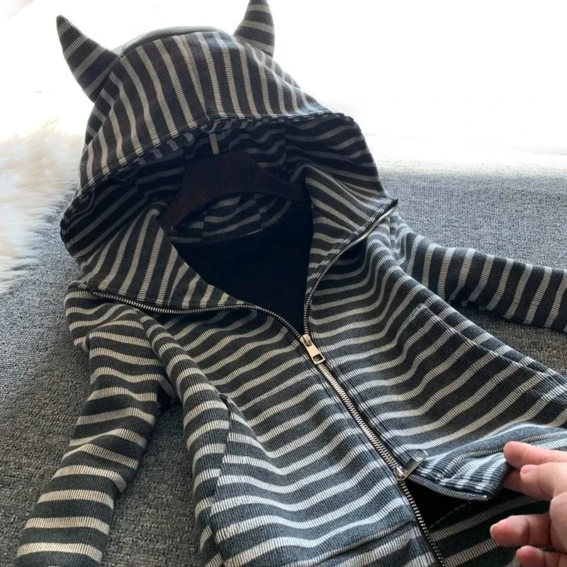 

Casual sports striped fashion two-piece suit for women in spring with a complete set of ear hooded tops and flared pants suits