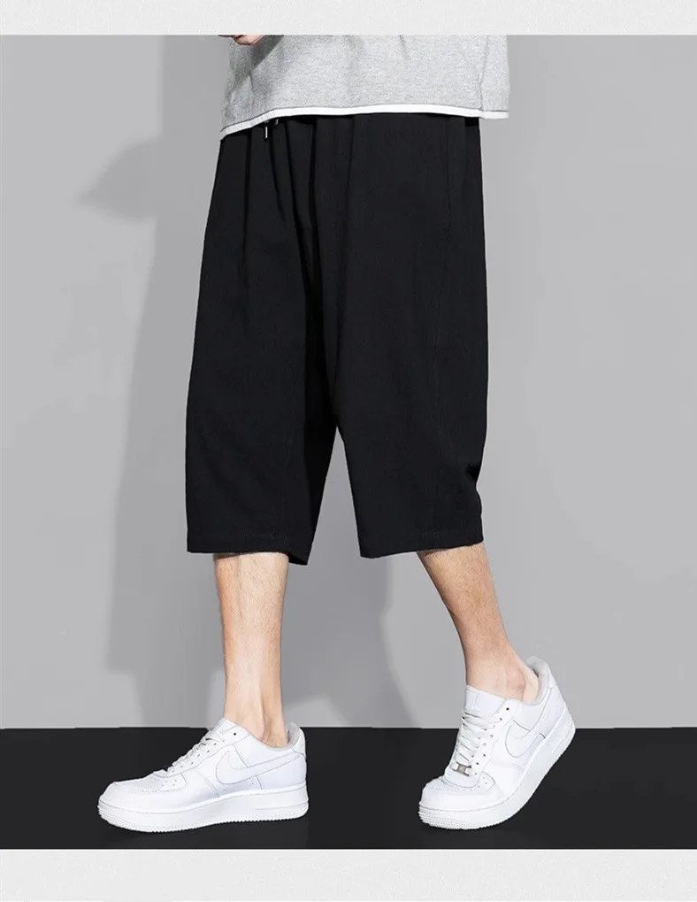 กางเกงขาสั้นผู้ชายทรงตรงแบบสบายๆ น้ำหนักเบา ผ้าบางเบา มีเชือกผูกเอว เหมาะสำหรับใส่ลำลอง ออกกำลังกาย หรือไปเที่ยวชายหาด
