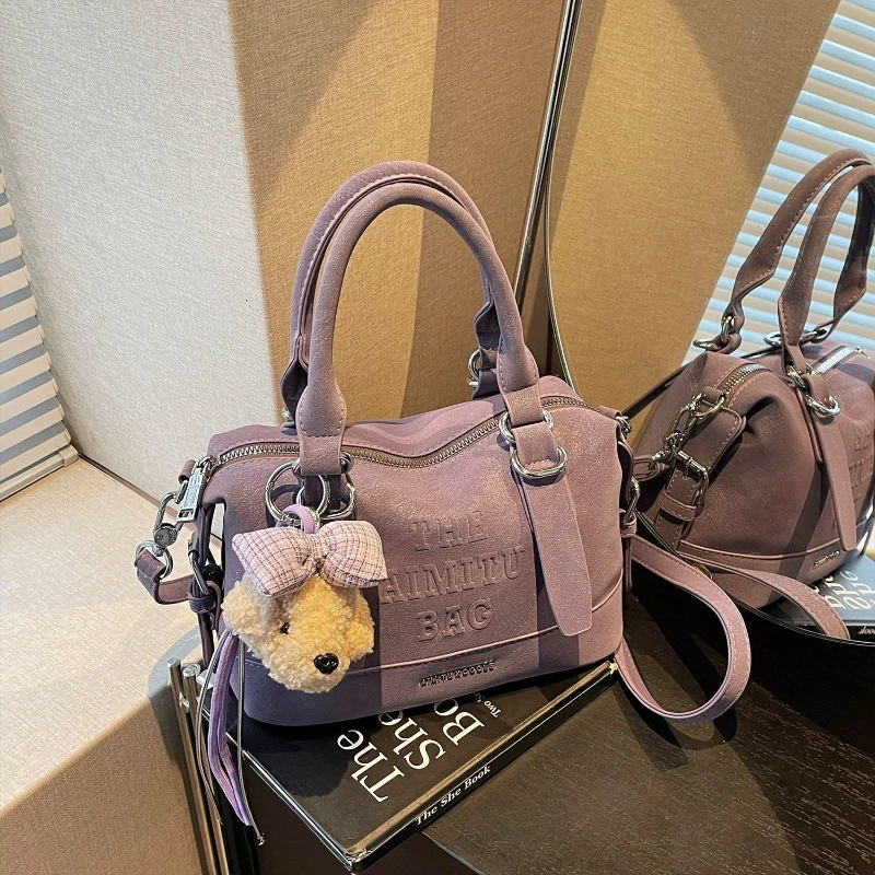 

Женская сумка 2026: Новая нишевая повседневная однотонная сумка-мессенджер с текстурой, универсальная модная портативная сумка-подушка