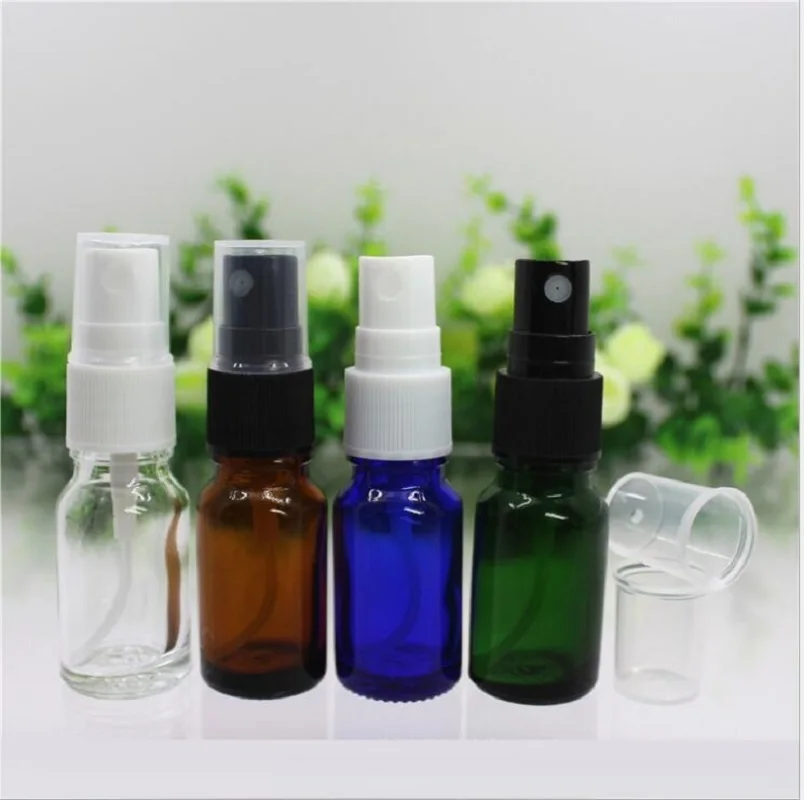 Flacone in vetro verde/trasparente/blu/marrone da 50 pezzi da 10ml con pompa spray per nebulizzazione nera bianca per l'imballaggio della pelle dell'acqua del siero dell'olio essenziale