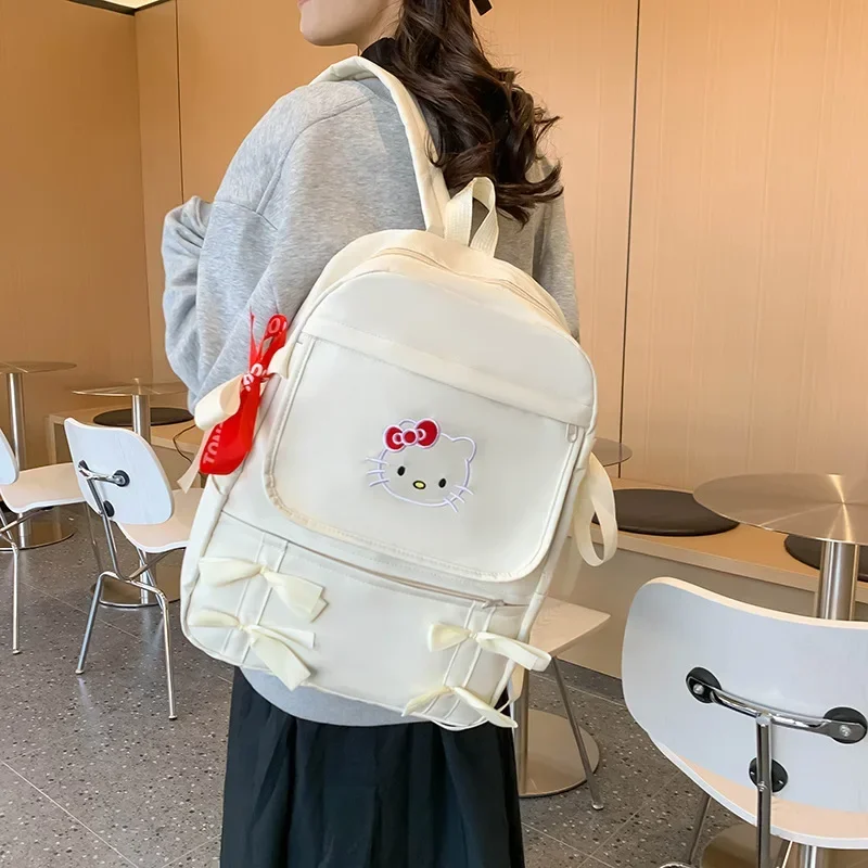 Hello Kitty tas sekolah kupu-kupu wanita, ransel kapasitas besar kartun sekolah dasar Sanrio belakang ganda