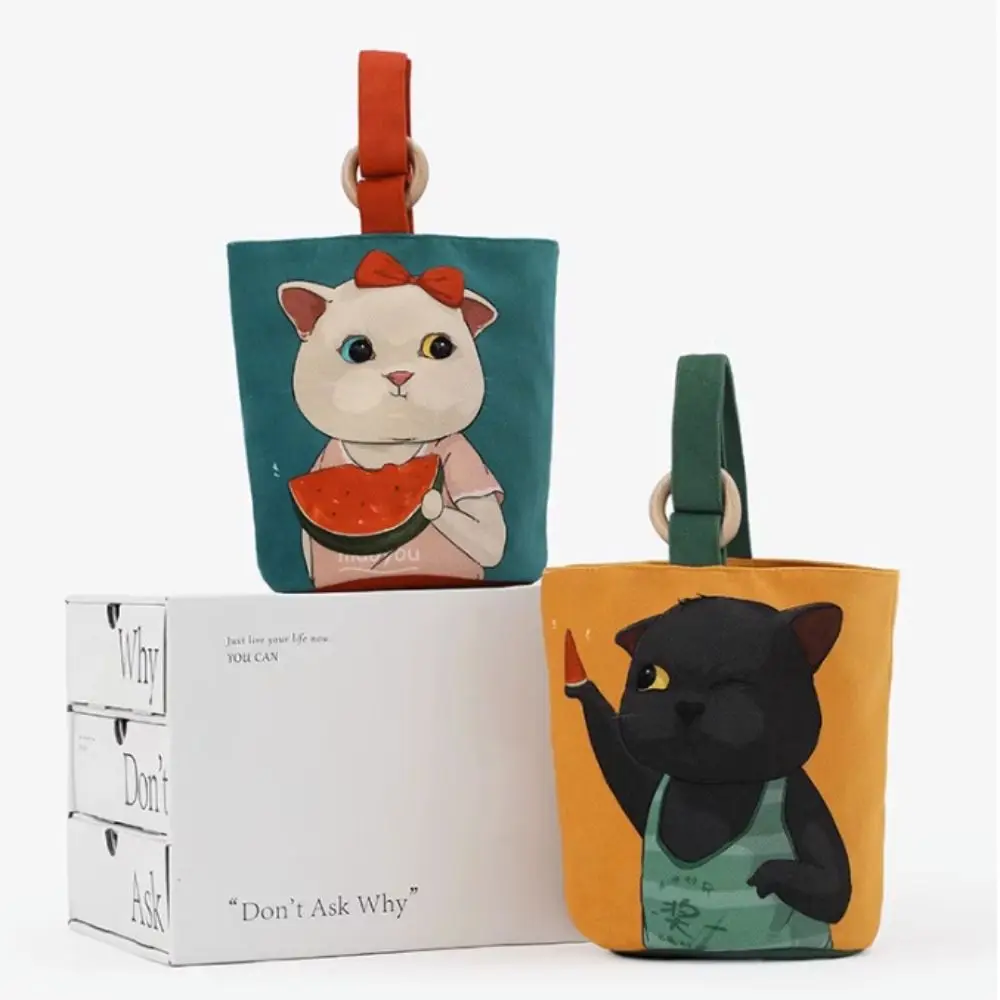 

Large Capacity Cartoon Graffiti Bucket Bag Eat Watermelon Cat Korean Style Canvas Handbag Handbag Lunch Bag Mummy Bag