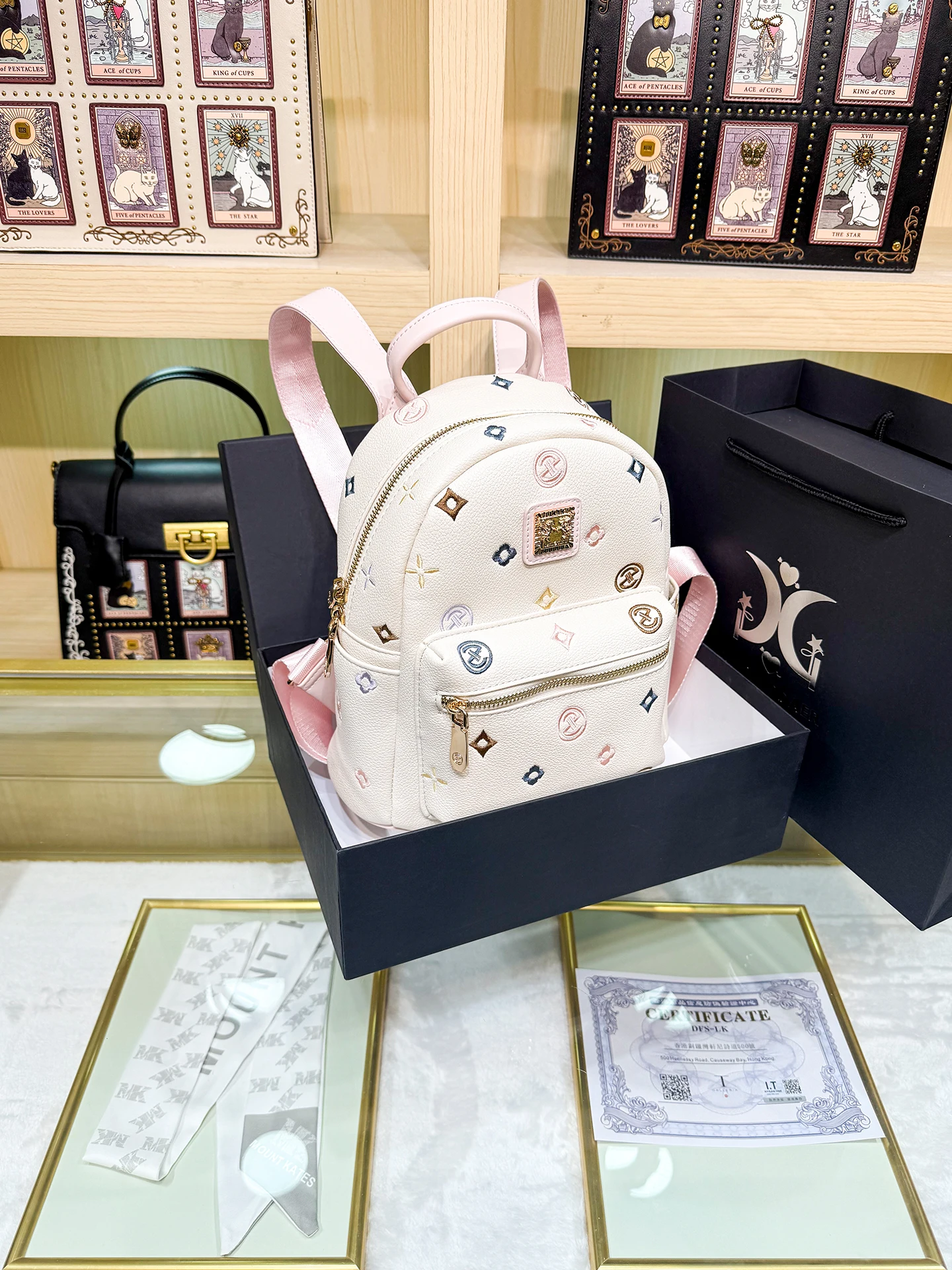 mack-jodaer-pink-embroidered-backpack-trendy-college-style-commuter-bag-soft-leather-straps-medium-hardness-waterproof