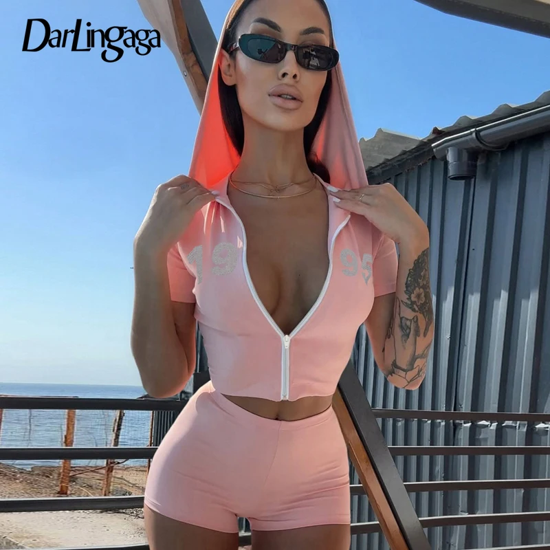 

Darlingaga Streetwear Pink Skinny Hooded Two Pieces Set Women Summer Zipper-Fly Short Sleeve Top+Low Waist Shorts Printed Outfit