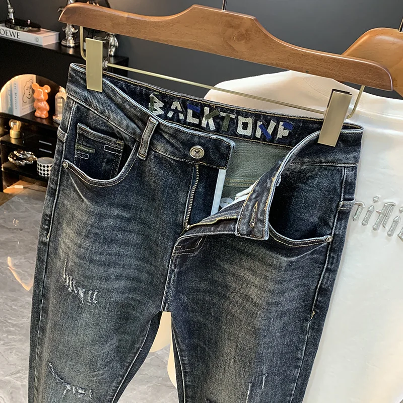 

2025 New Micro Haren Piercing Jeans for Men's Autumn Fashion Trend, Conical Small Foot Casual Elastic Pants