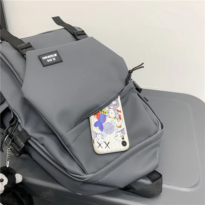 Mochila escolar Harajuku para hombre, morral negro de moda para estudiantes universitarios, resistente al agua, novedad de 2021