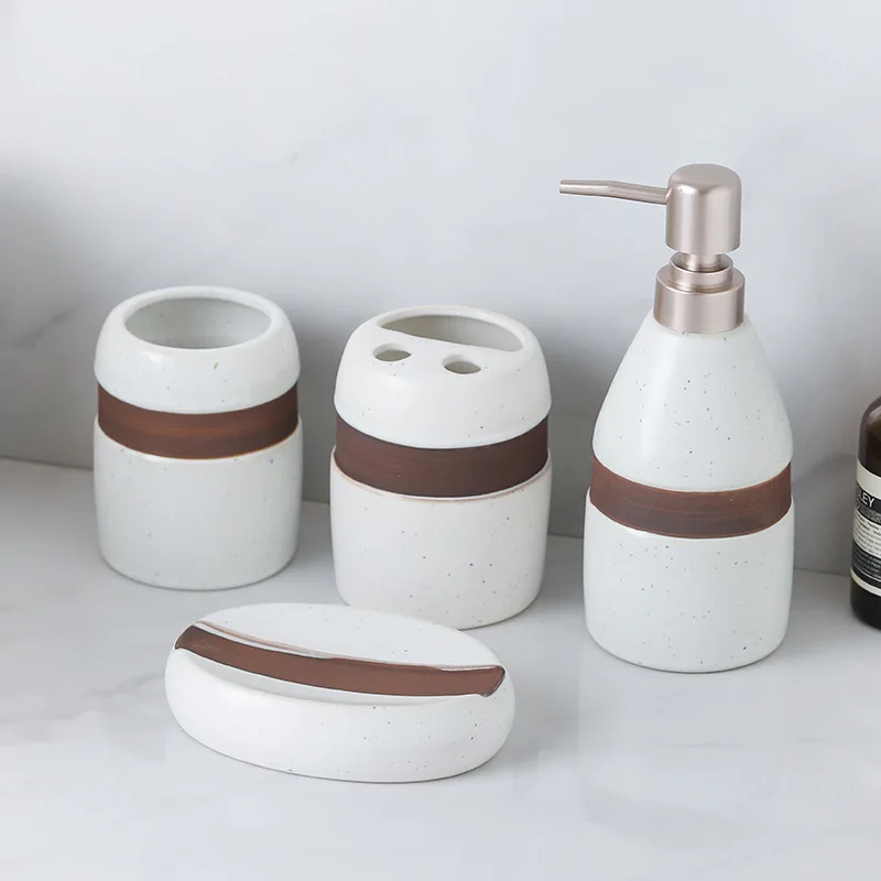 

toiletries, separate bottles, spotted red circles, bathroom, lotion bottle, soap dish, ceramic bathroom four-piece set