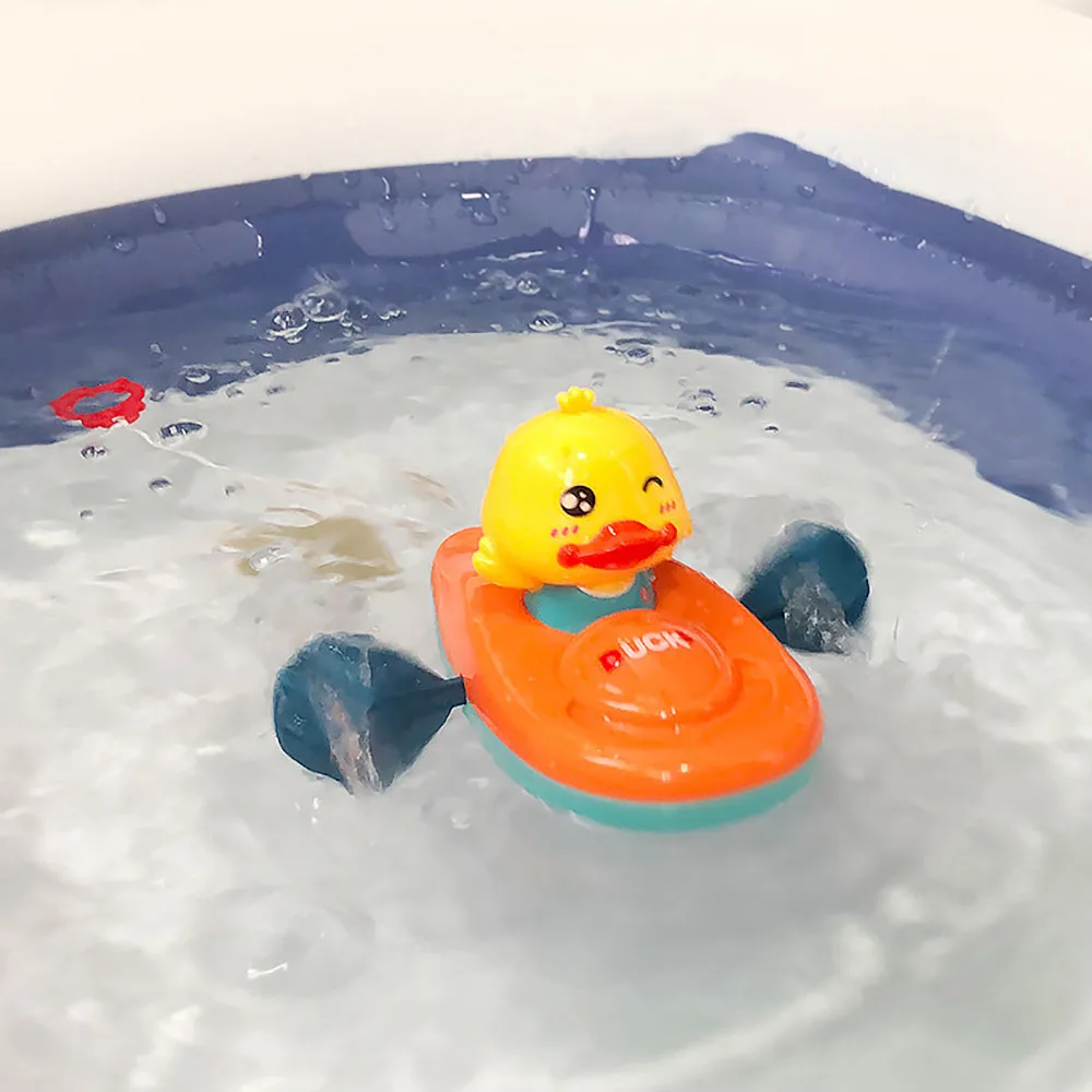 1Pc Little Cartoon Yellow Duck Kayak Toy Swimming Pool Bathroom Toys For Baby Bathing Swim Duck Chain Clockwork Toy for Children